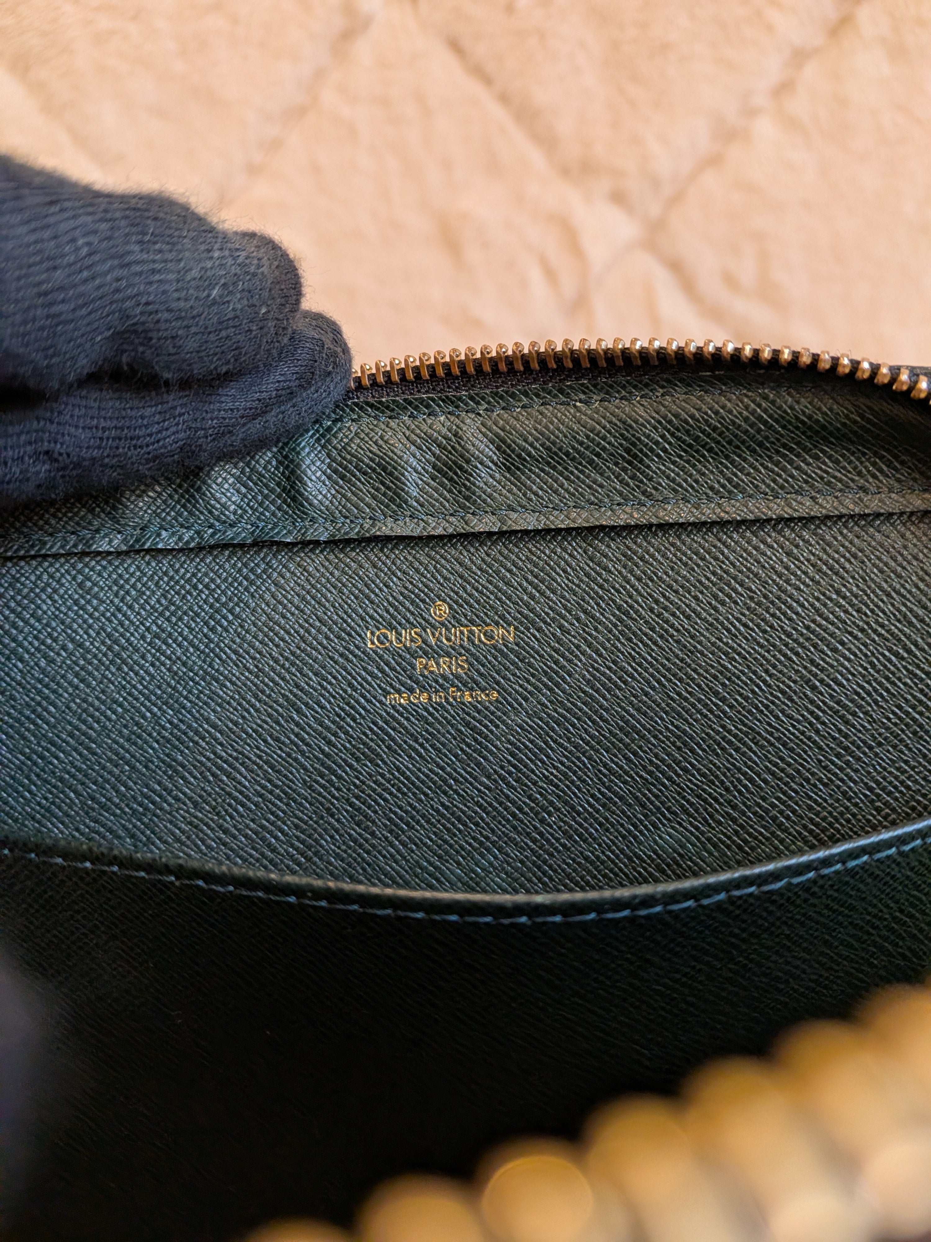 Louis Vuitton Baikal Wristlet Clutch Taiga Leather Dark Green