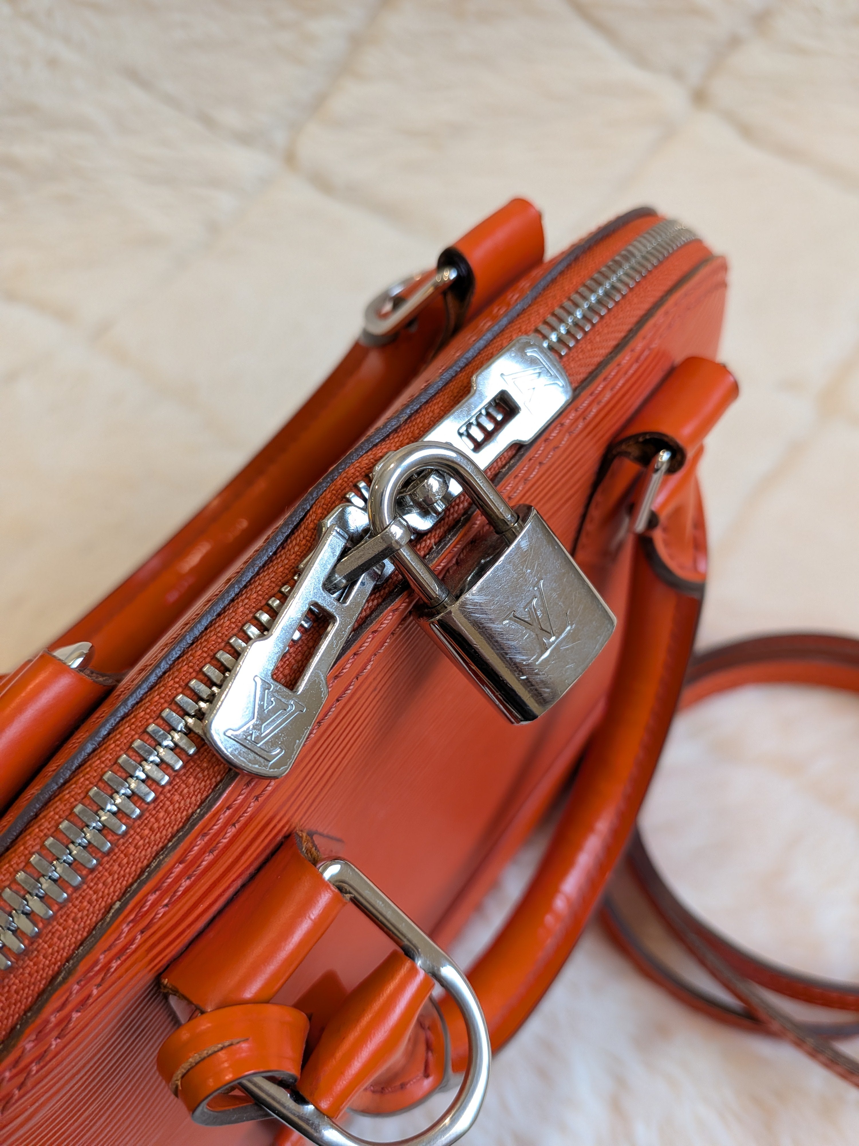 Louis Vuitton Bb Alma Epi Leather Orange