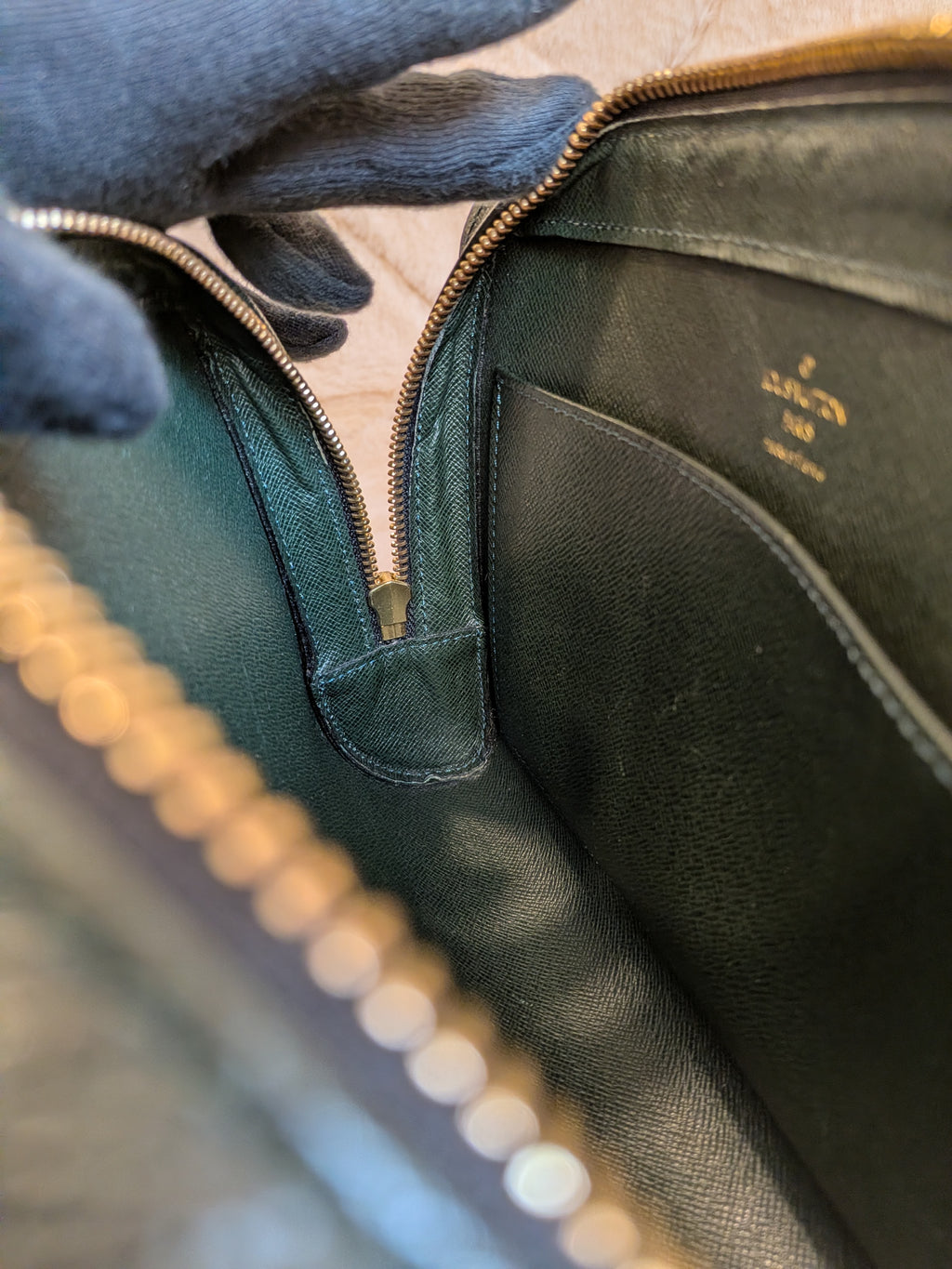 Louis Vuitton Baikal Wristlet Clutch Taiga Leather Dark Green