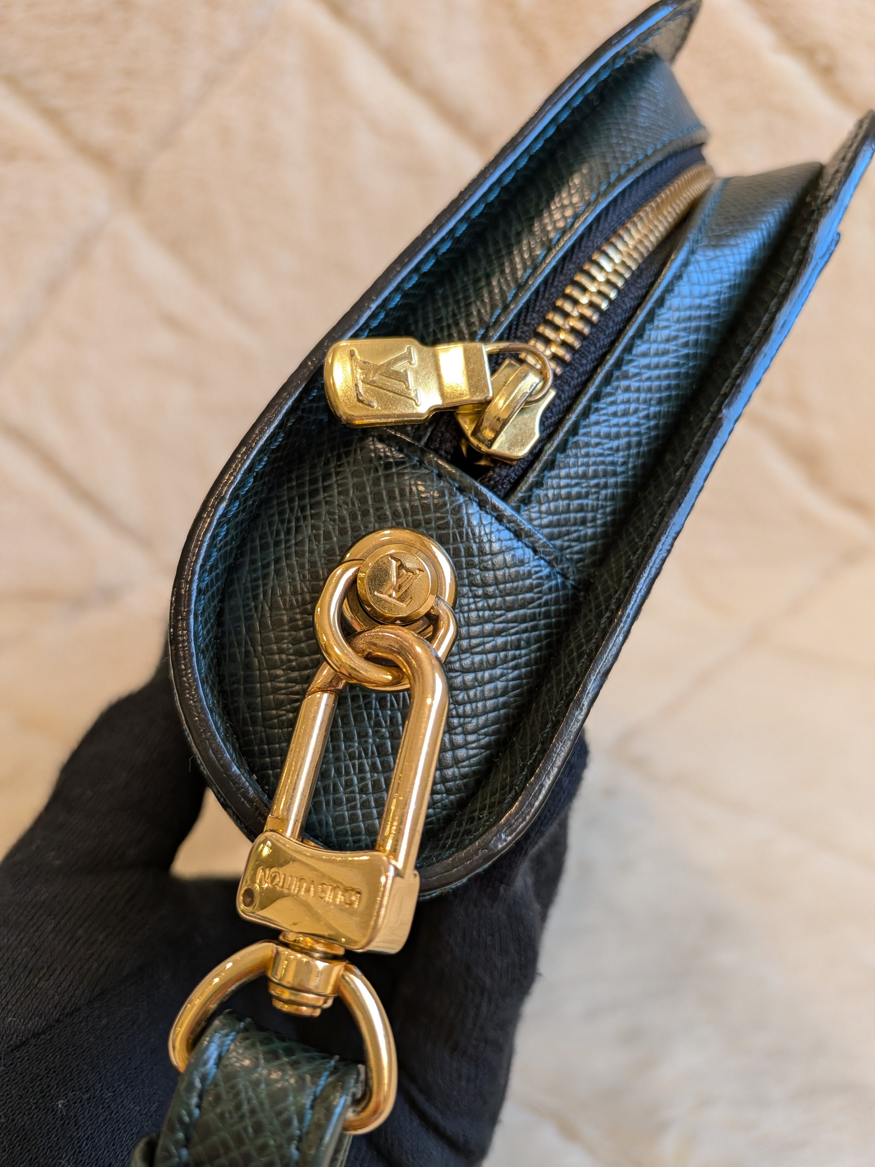 Louis Vuitton Baikal Wristlet Clutch Taiga Leather Dark Green