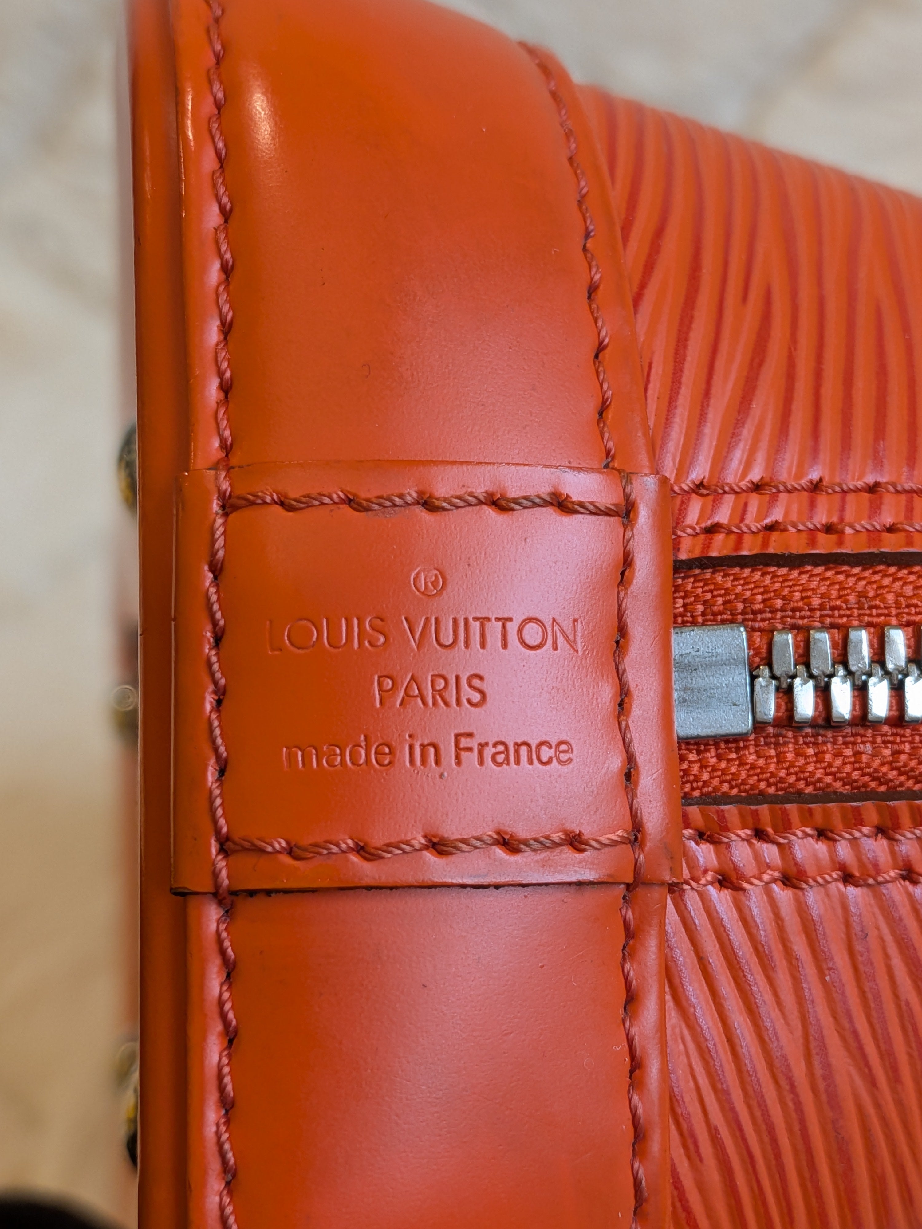 Louis Vuitton Bb Alma Epi Leather Orange