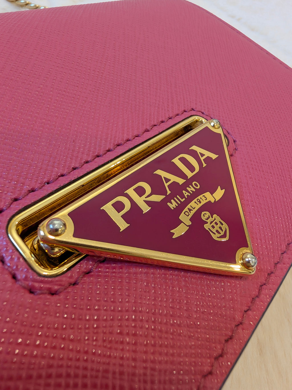 Prada WOC Saffiano Lux Flip Lock Peonia Pink