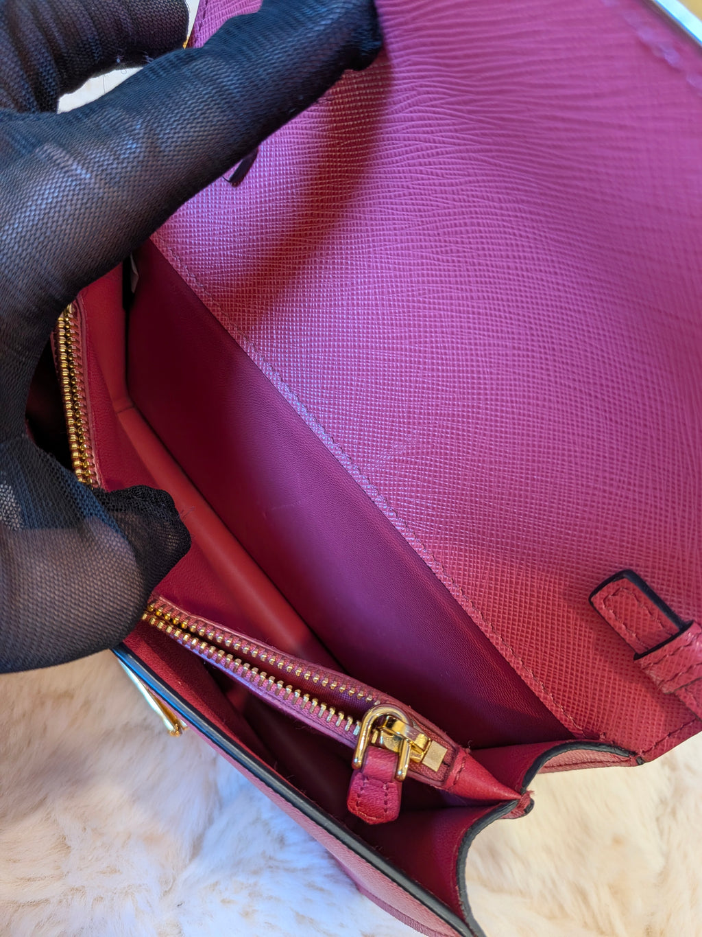 Prada WOC Saffiano Lux Flip Lock Peonia Pink